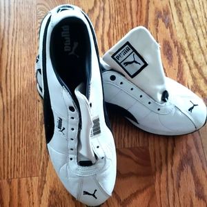 White with black detail PUMAs